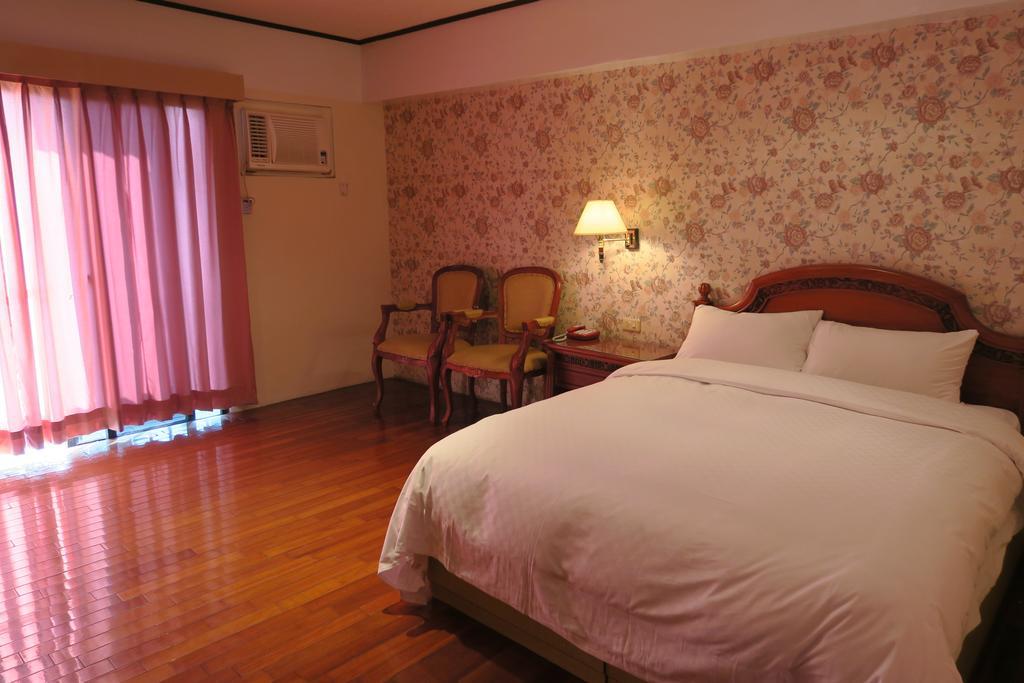 Champagne Hotel Jiaoxi Room photo