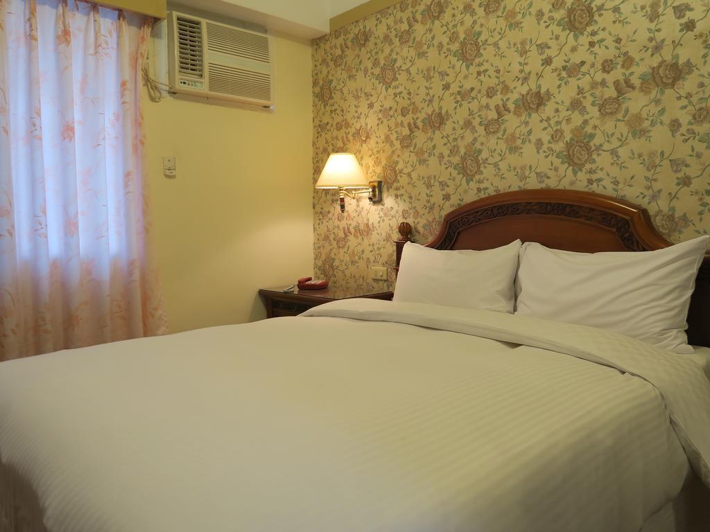 Champagne Hotel Jiaoxi Room photo